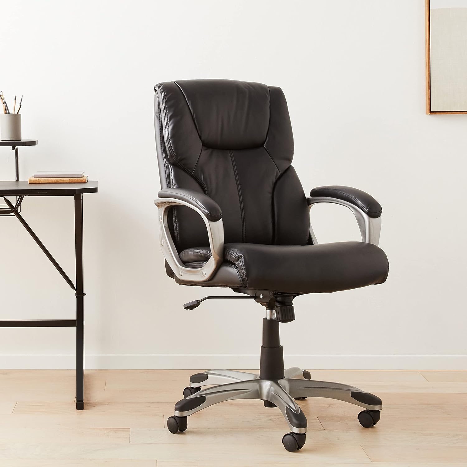 Amazon Basics Executive High Back Office Chair, Adjustable Height, Tilt, Swivel, Padded Seat, Bonded Leather, Wheels, Black/Silver