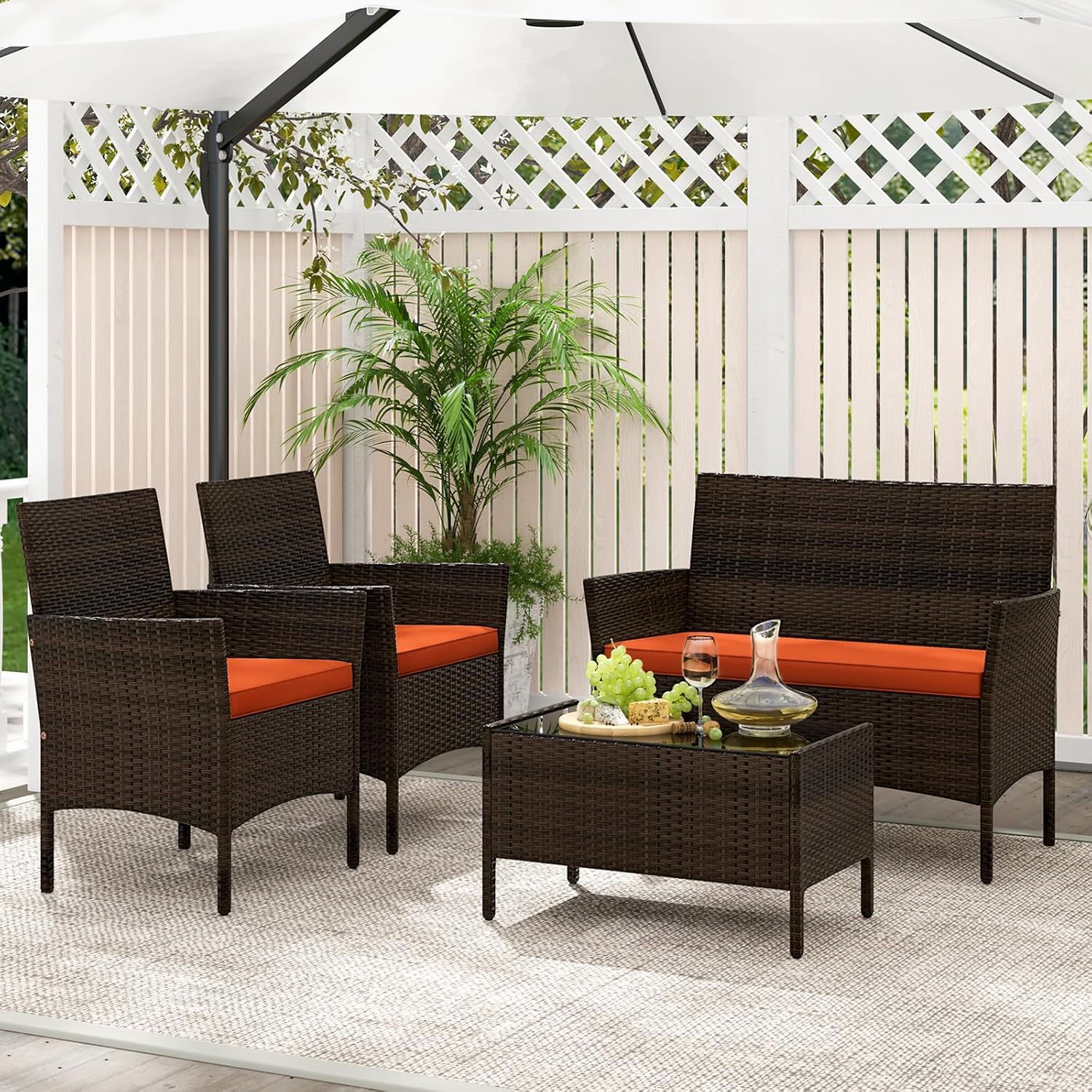KOTEK 4 Piece Patio Furniture Set, Outdoor Rattan Conversation Set with Loveseat, Wicker Chairs, Tempered Glass Coffee Table, Wicker Patio Set for Backyard, Porch (Orange)